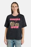 Black short-sleeve T-shirt with pink "CERISES LOVER" text and leopard-print cherries, worn by model in front view.