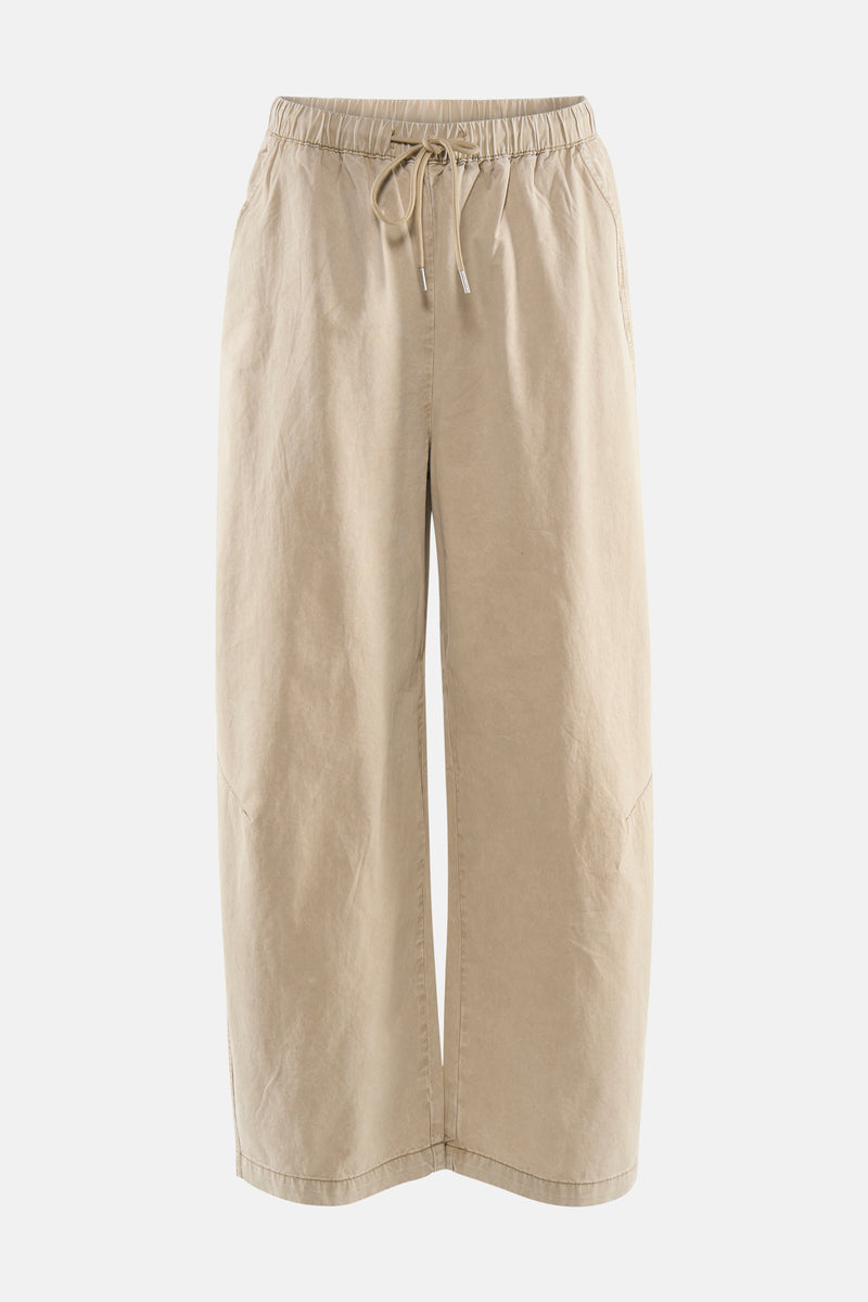Pantalon beige de ADORE, avec une taille élastique et cordon de serrage, coupe ample.
