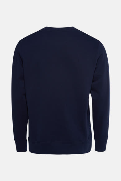 Blauwe STROM-sweater, achterkant, met een discrete textuur op een neutrale achtergrond.