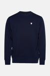 Blauwe STROM-sweatshirt met een klein decoratief motief op de borst.