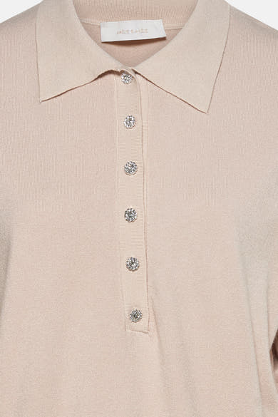 Beige gebreide trui van AMELIE ET AMELIE met glanzende decoratieve knopen, polokraag en lange mouwen.