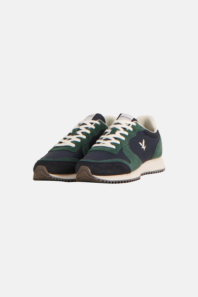 Baskets bleues de LYLE & SCOTT avec empiècements verts et lacets blancs.