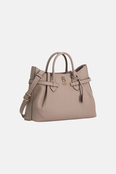Taupe leather handbag by Guess with gold-tone hardware and adjustable shoulder strap, front view