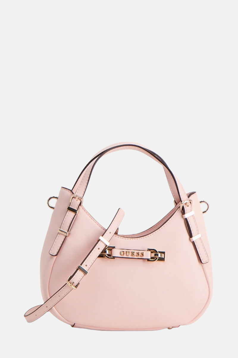 Roze Guess handtas, met een dunne, verstelbare schouderriem en gouden gespdetails.