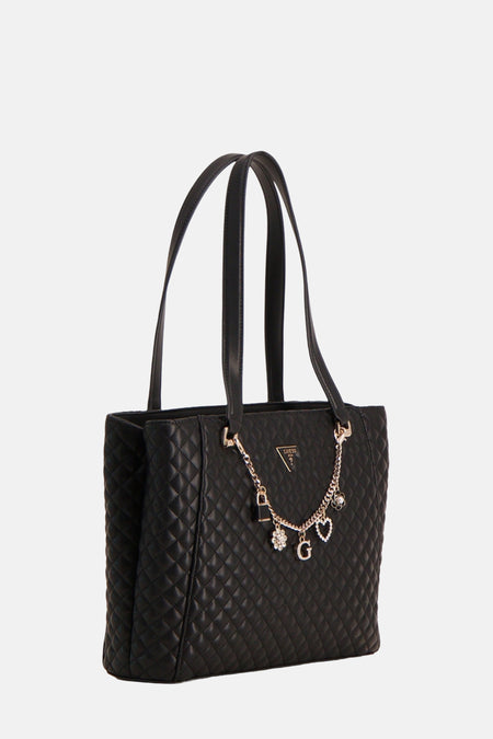 Zwarte Guess schoudertas met ruitvormig gewatteerd patroon, decoratieve gouden ketting en dunne bandjes.