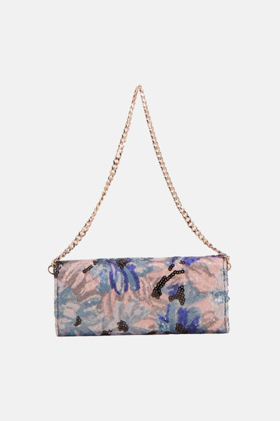 Sac à bandoulière multicolore de Guess®, orné de sequins et d'un motif floral, avec une bandoulière chaîne dorée.