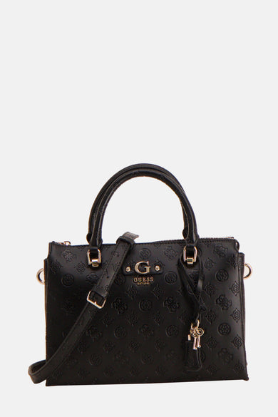 Sac à main noir Guess avec motif logo en relief, bandoulière ajustable et breloque décorative.