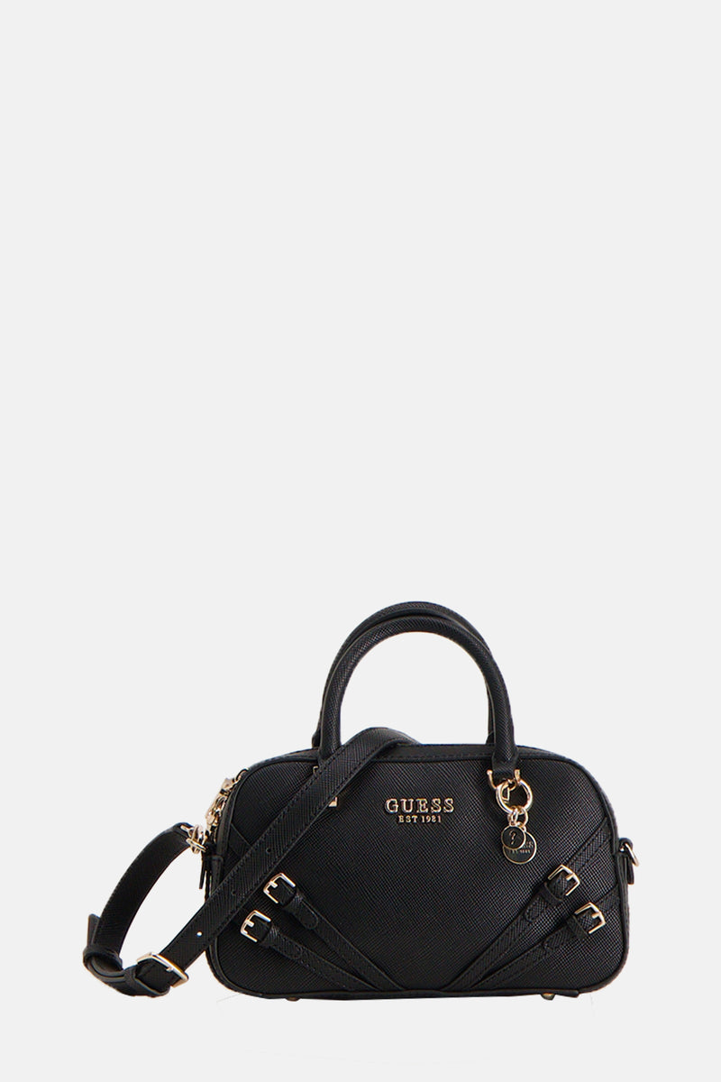 Zwarte Guess handtas met schouderriem, korte hengsels en decoratieve banden met gespen.