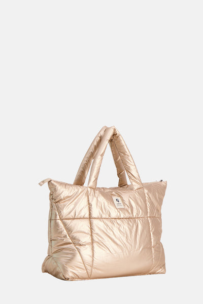 Sac à bandoulière doré de GARCIA, motif matelassé et texture brillante.