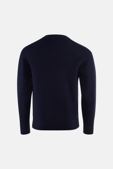 Navy blue crewneck sweater back view, ribbed cuffs and hem, smooth knit texture