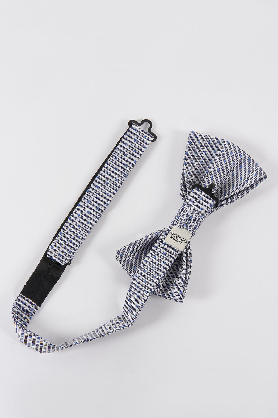 Nœud papillon bleu à motifs par Le Fabuleux Marcel de Bruxelles, avec système de fixation et détails tissés.
