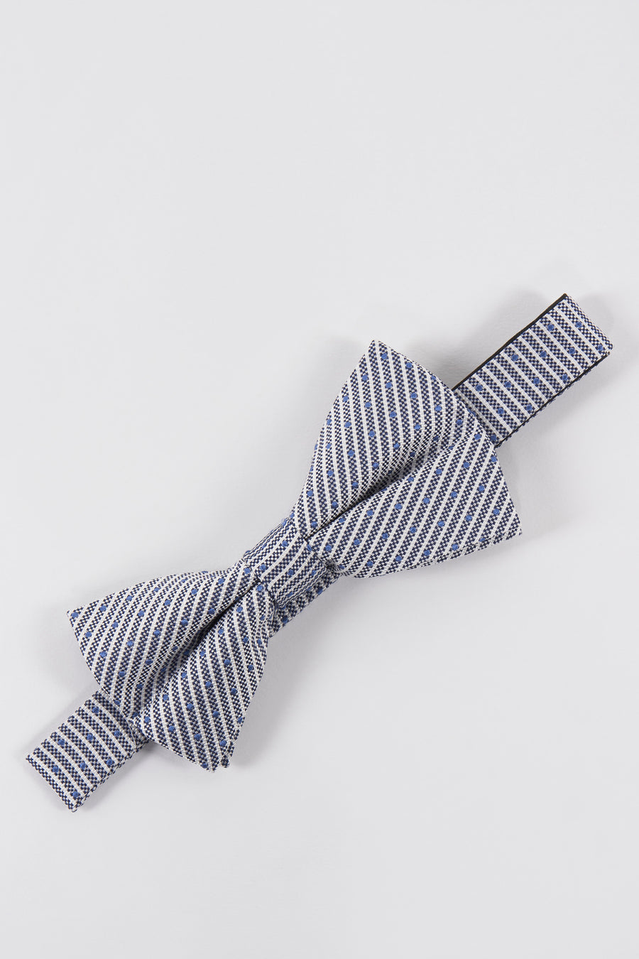 Nœud papillon bleu Le Fabuleux Marcel de Bruxelles avec rayures blanches et pois bleus.