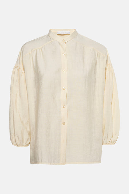 Gele blouse met lange mouwen van AMELIE ET AMELIE, met geplooide details op de rug.