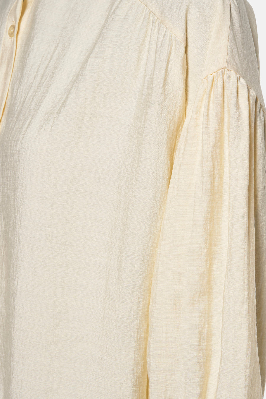 Gele blouse met lange mouwen van AMELIE ET AMELIE, met pofmouwen en subtiele textuur.