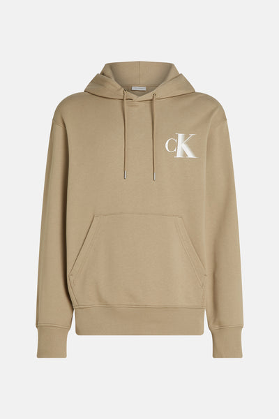 Beige hoodie van Calvin Klein, met 'ck' logo op de voorkant en kangoeroezak.