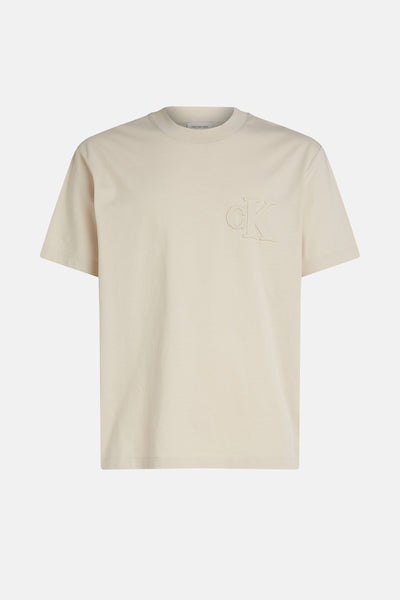 Beige T-shirt met korte mouwen van Calvin Klein Jeans, met toon-op-toon logo op de borst.
