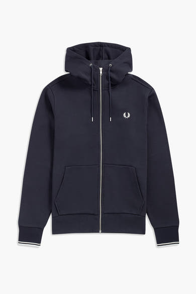 Blauwe bodywarmer van Fred Perry, met capuchon, ritssluiting en geborduurd logo op de borst.