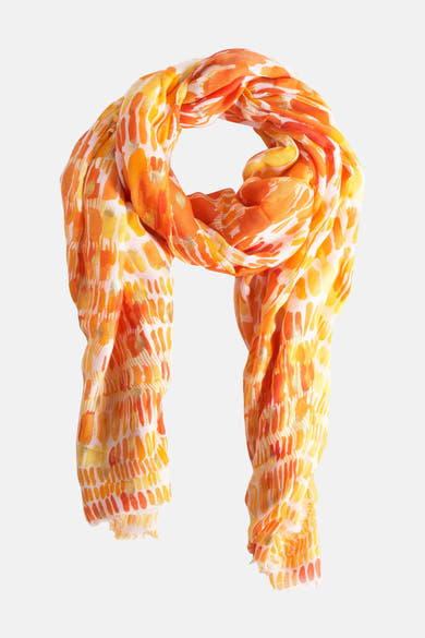 Foulard orange de Access® avec motif abstrait tacheté et finitions légèrement frangées.
