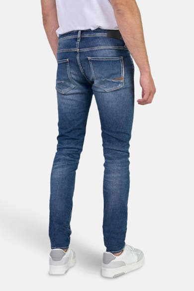 Jean slim en denim bleu foncé de Le Temps des Cerises, vue arrière.