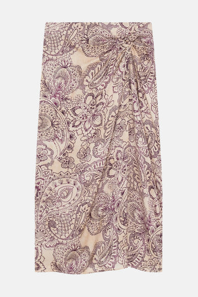 Jupe 3/4 multicolore de CAROLL, avec un motif cachemire sur toute la surface et un effet noué.
