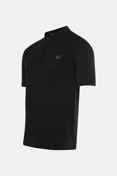 Pull vert FRED PERRY texturé avec boutons et logo brodé sur la poitrine.