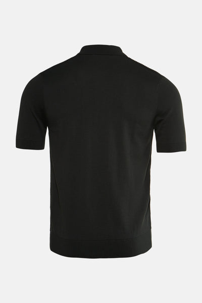 Pull vert de FRED PERRY, en maille fine unie, avec des manches courtes.