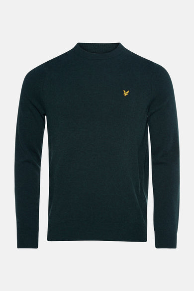 Pull à col rond vert foncé de Lyle & Scott avec le logo brodé sur la poitrine.