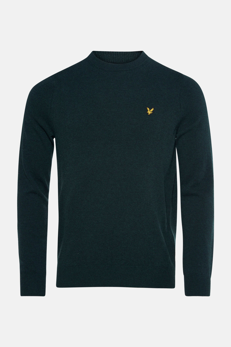 Pull à col rond vert foncé de Lyle & Scott avec le logo brodé sur la poitrine.