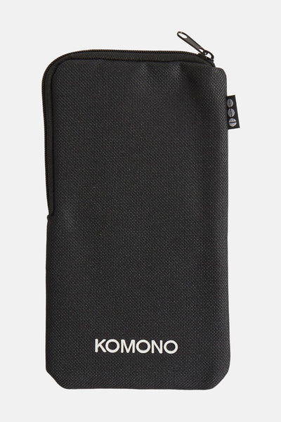 Zwarte Komono hoes, met ritssluiting en een getextureerd patroon.