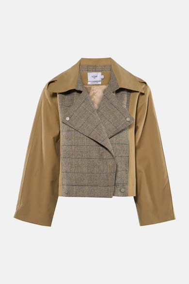Veste courte beige de ADORE, avec empiècement à carreaux et coupe asymétrique.