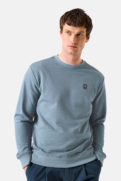 Blauwe rondehals sweatshirt van GARCIA, subtiele print en logopatch op de borst.