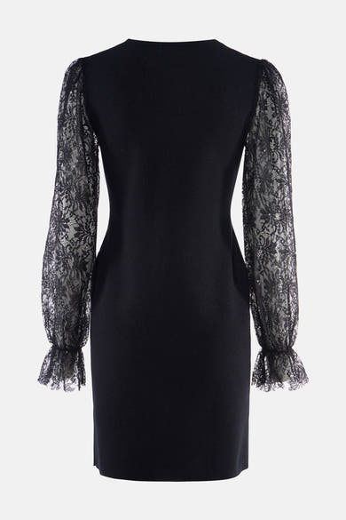 Robe noire à manches longues en dentelle par Molly Bracken, vue arrière, détails floraux et finitions frangées
