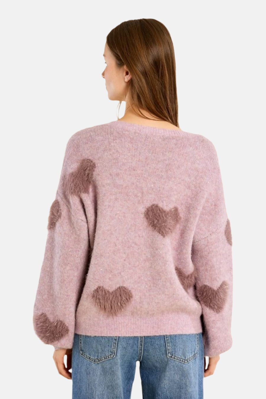 Multicolored O-neck sweater with fluffy heart appliqués, back view, worn with blue jeans