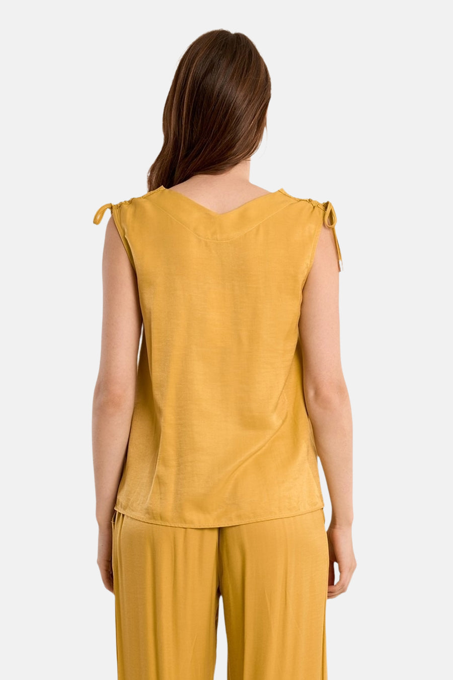 Gele blouse met korte mouwen van Molly Bracken, met decoratieve bandjes op de schouders en een getextureerde stof.