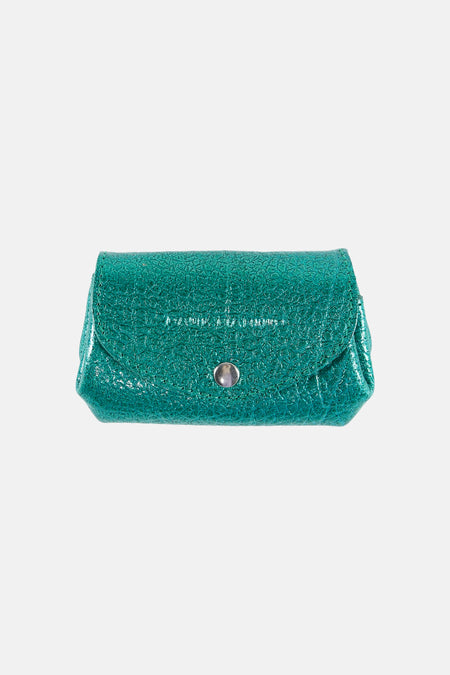 Sac à main turquoise texturé façon reptile de PAUL MARIUS, avec un bouton-pression argenté.