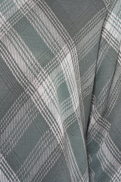 Sweat vert col rond de ZABAIONE, à motif tartan écossais avec des détails de texture tricotée.
