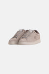 Beige suede sneakers by Lyle & Scott with tonal laces, embroidered bird logo, and white rubber sole, front view