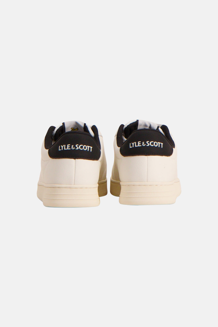 Ecru leather sneakers by Lyle & Scott, back view with black heel tabs and white branding, clean minimal design