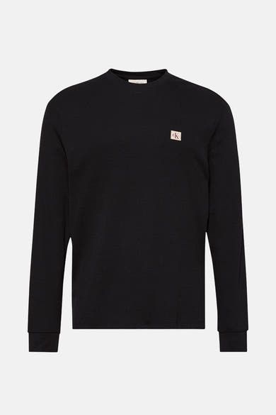 Zwart T-shirt met lange mouwen van Calvin Klein met een gewafeld textuurpatroon en een vierkant logo op de borst.
