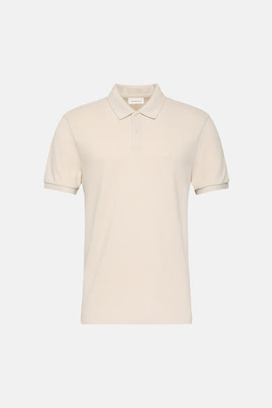 Polo à manches courtes écru de Calvin Klein Jeans, avec patte de boutonnage et logo sur la poitrine.