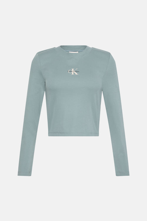 T-shirt à manches longues vert de Calvin Klein, avec texture côtelée, coupe courte et logo CK sur la poitrine.