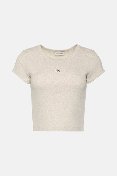 Beige T-shirt met korte mouwen van Calvin Klein Jeans, in ribgebreide stof met rode logo op de voorkant.