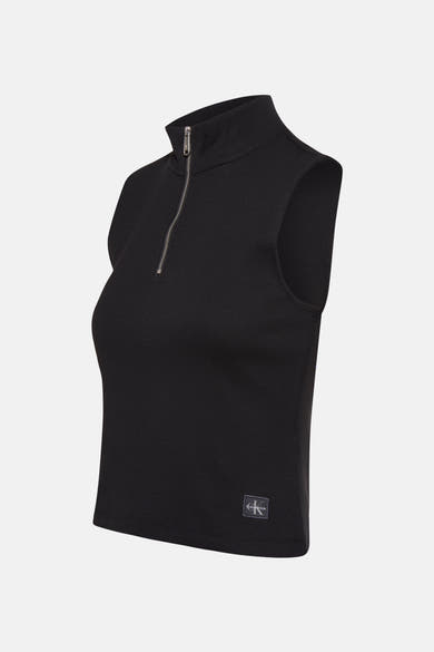 Top sans manches noir de Calvin Klein Jeans avec fermeture éclair et texture côtelée.