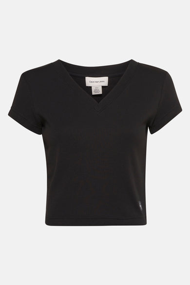 T-shirt noir à manches courtes de Calvin Klein Jeans, en maille côtelée.
