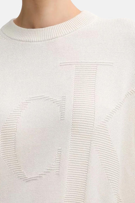 Beige rondehals sweatshirt van Calvin Klein, met het merklogo in een toon-op-toon patroon.