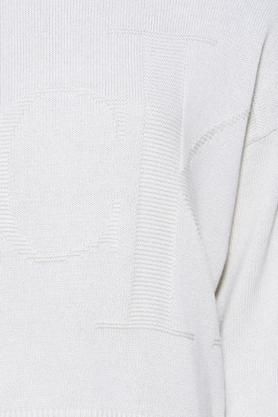Beige rondehals sweatshirt van Calvin Klein, in een getextureerd breisel met toon-op-toon patroon.