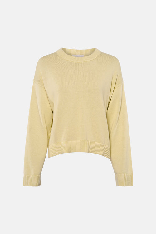 Pull à col rond jaune clair de Calvin Klein, en maille côtelée fine.