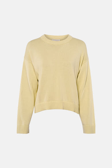 Lichtgele rondehals trui van Calvin Klein, in fijne ribgebreide stof.