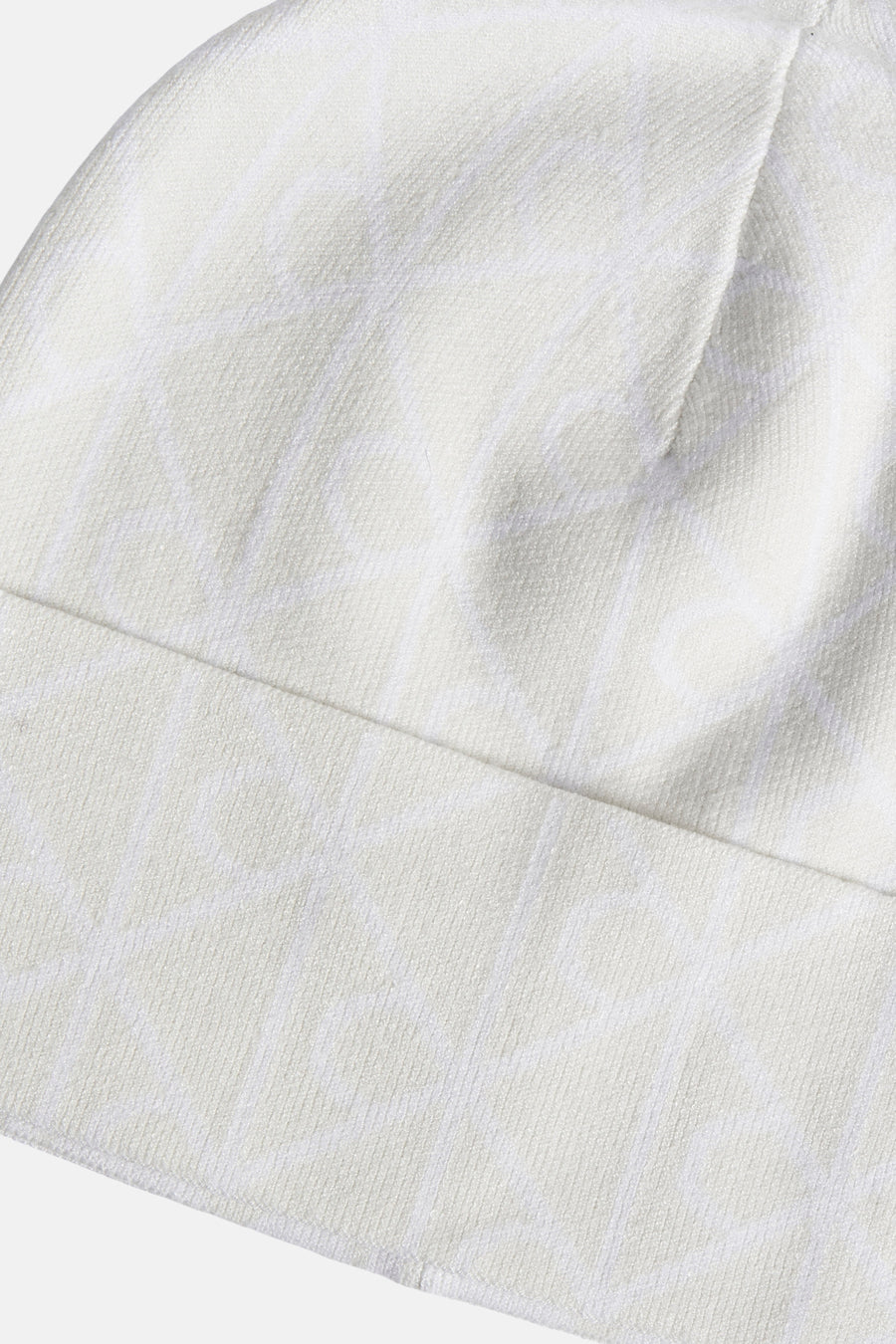 Bonnet beige de Calvin Klein avec motif subtil sur toute la surface et texture côtelée.