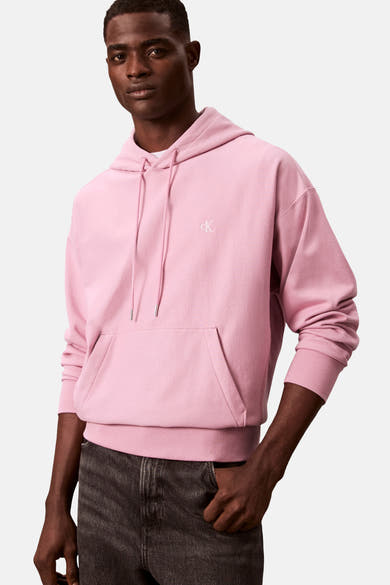 Sweat à capuche rose en coton par Calvin Klein, avec cordon de serrage et poche kangourou.
